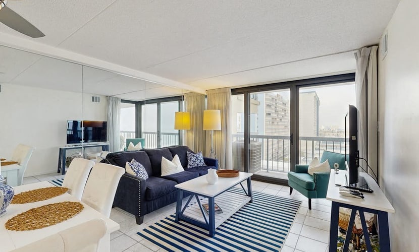 Modern, ocean-view condo with balcony, pools, saunas, tennis & gym