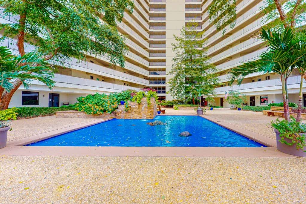 Incredible beach condo with balcony, pools, game room, gym & sauna