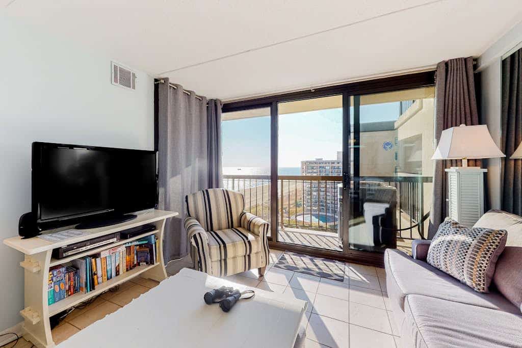 Stunning beach condo with balcony, views, pools, gym, game room & sauna