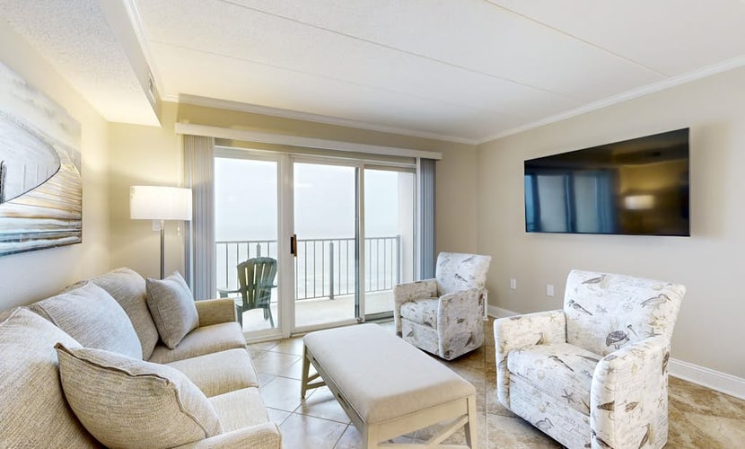 Inviting oceanfront condo with hot tub, balcony, central AC, & W/D