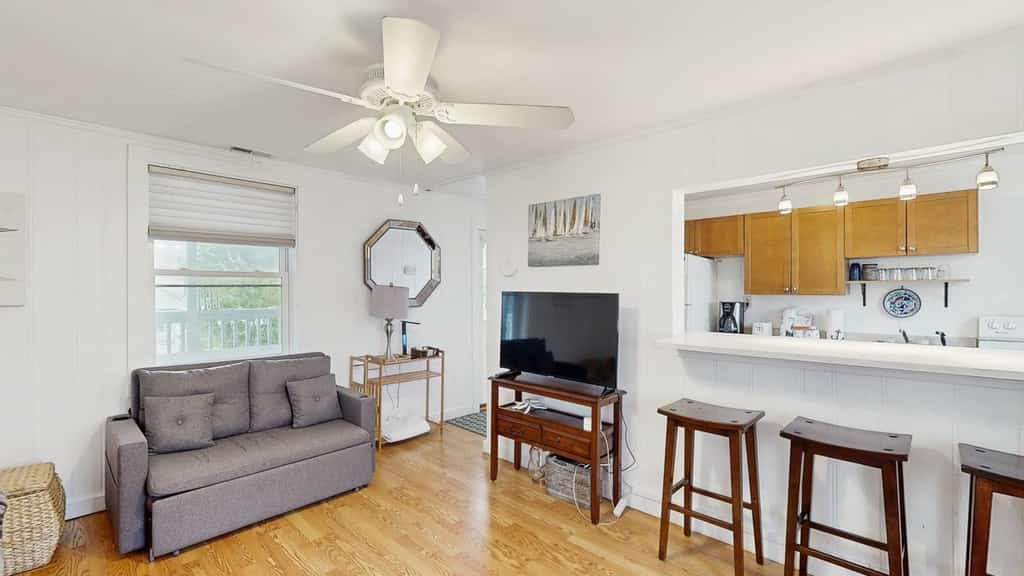 Inviting condo near the beach with balcony, central AC, & full kitchen