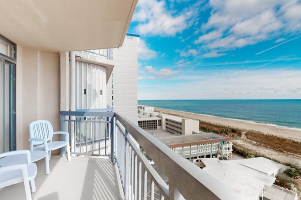 Beachfront condo with bay/ocean views, outdoor pool, & tennis courts