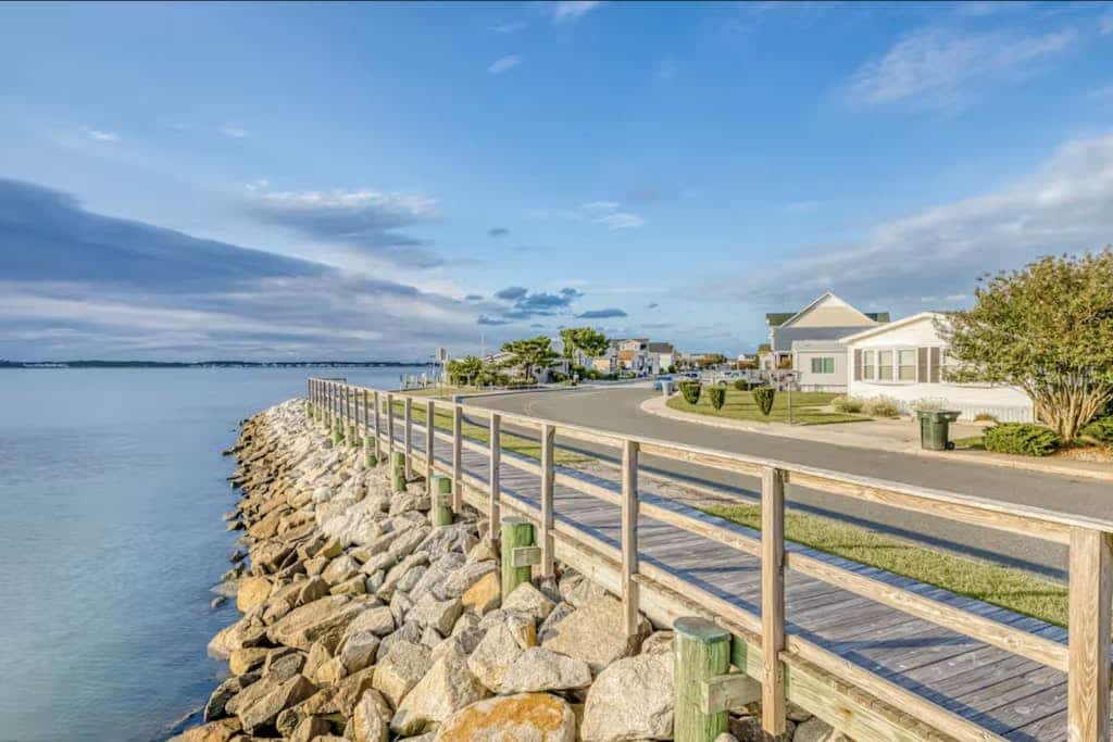 Comfortable home near beach with screened porch, pool, tennis, & mini-golf