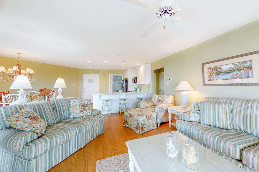 Waterfront escape with two pools, outdoor shower, balcony, WiFi & central AC