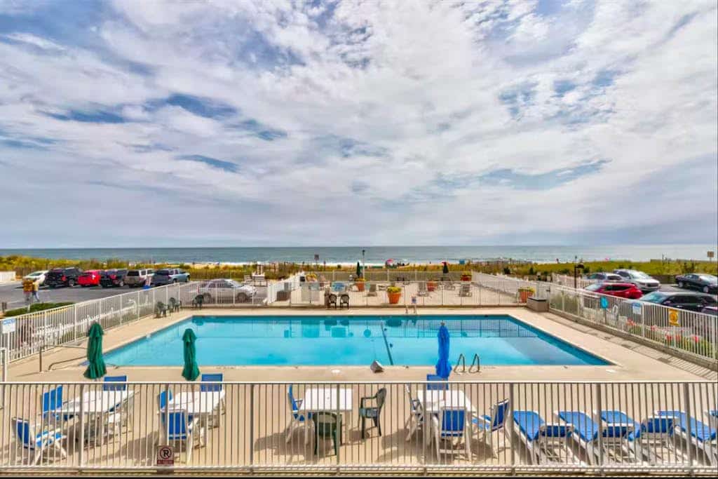 Beachfront condo with ocean and bay views, fast WiFi, pools, & game room