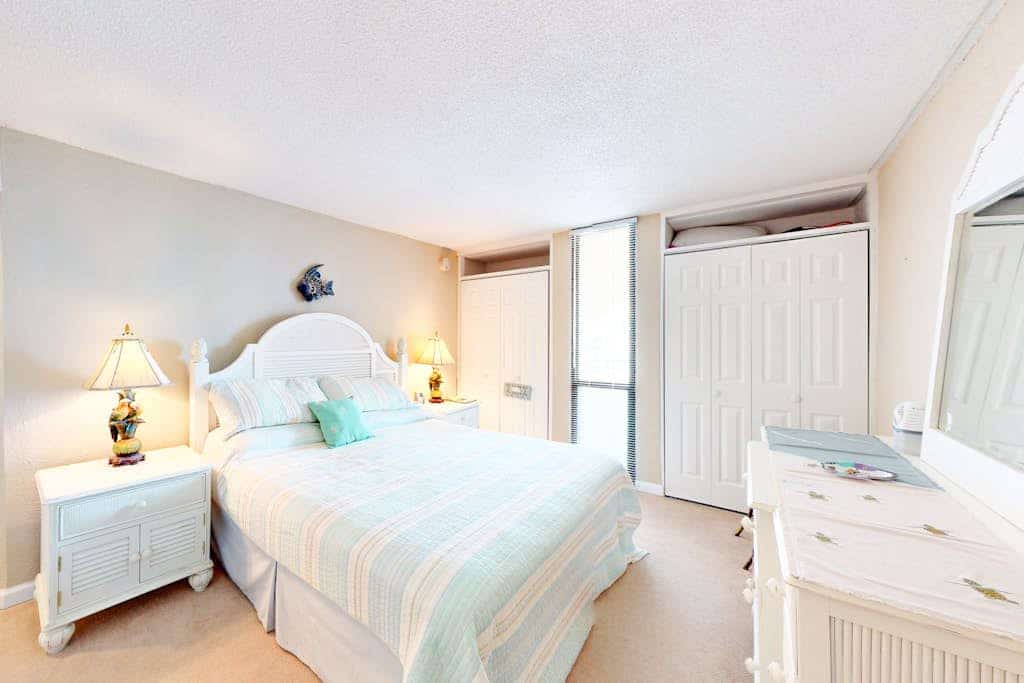Updated beachfront condo with balcony, ocean view, WiFi, W/D, AC, & pool
