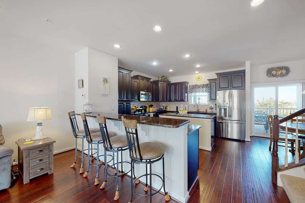 Bay-view townhome with pool & private outdoor living - walk to dining