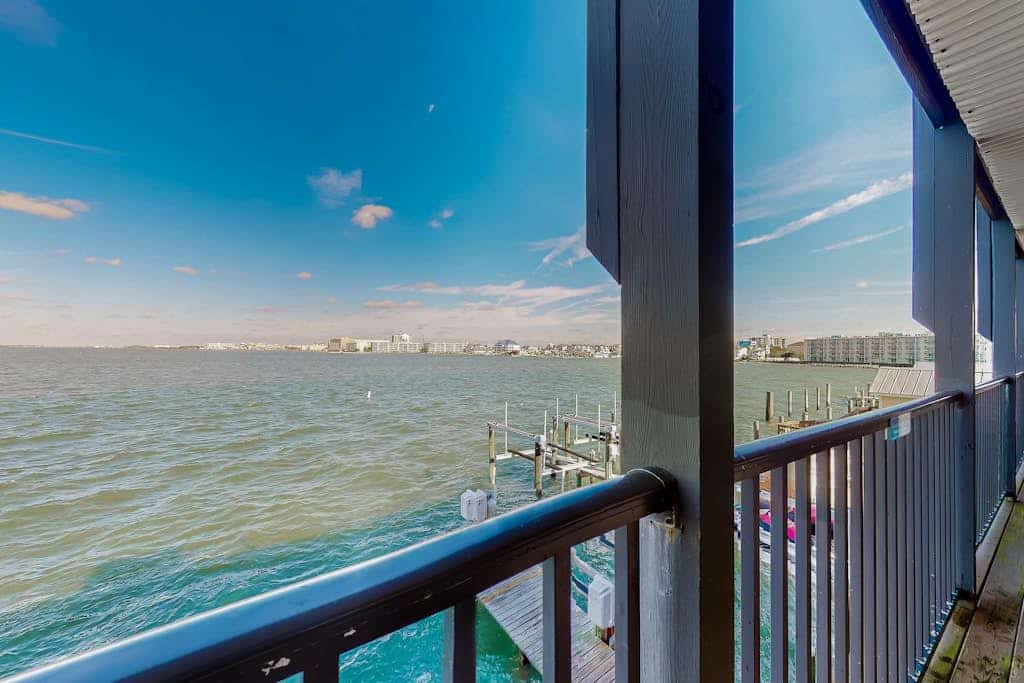 Bay-view condo with pool, covered deck, & fishing/crabbing dock - walk to beach