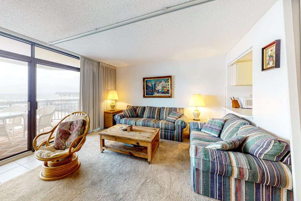 Ocean-view condo with private balcony, central AC, & shared pool/tennis court