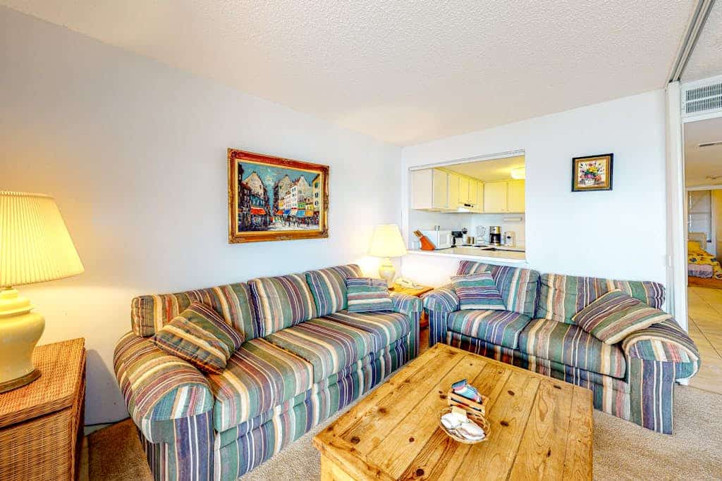 Ocean-view condo with private balcony, central AC, & shared pool/tennis court