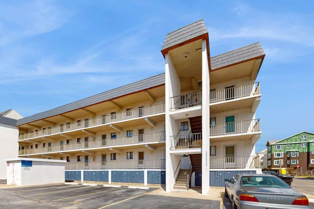 Dog-friendly 1st-floor end condo with beach entrance view - steps to the beach
