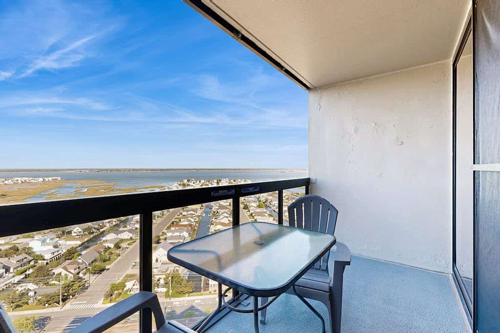 Beachfront resort condo with central AC, ocean views, balcony, pools & amenities