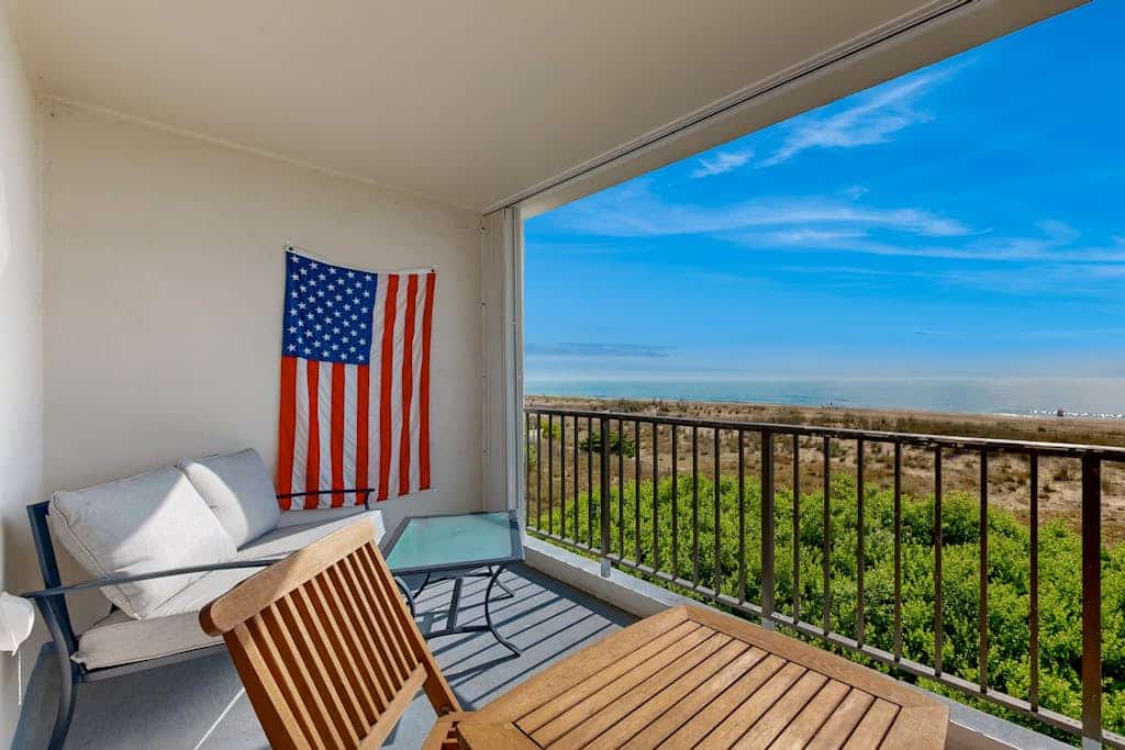 Waterfront perch with pool, private balcony, beach access, and WiFi