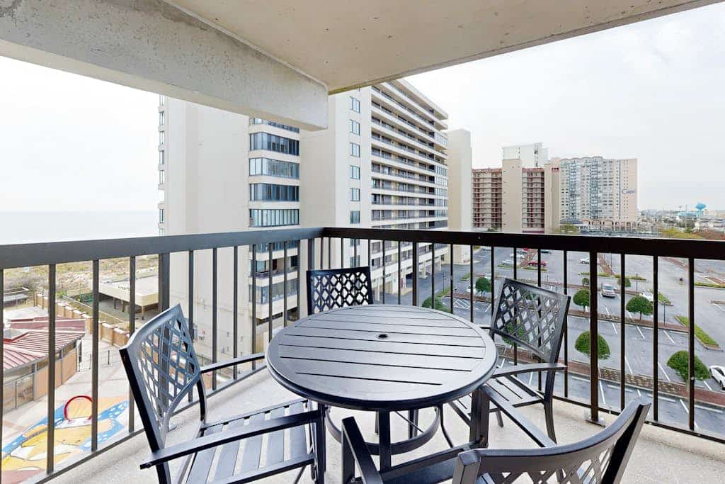 Beachfront resort condo with ocean views, balcony, pool & central AC