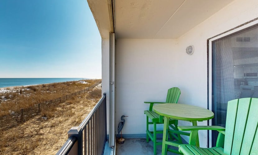 Oceanfront condo with high-speed WiFi, beach access, central AC & washer/dryer