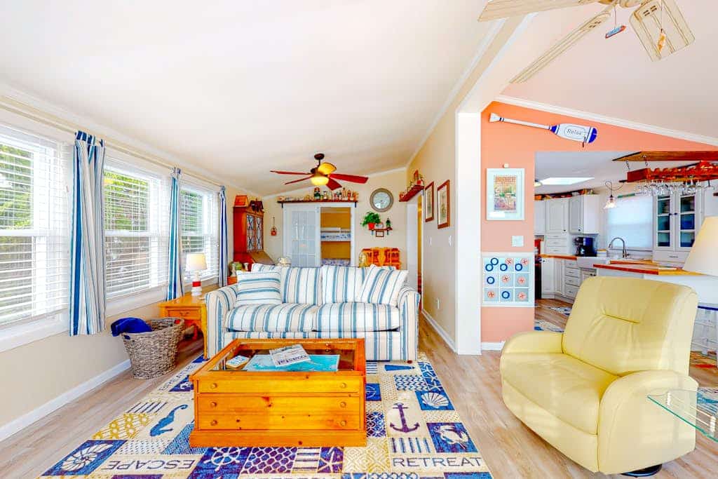 Canal front home with free WiFi, deck, private dock, shared pool & tennis