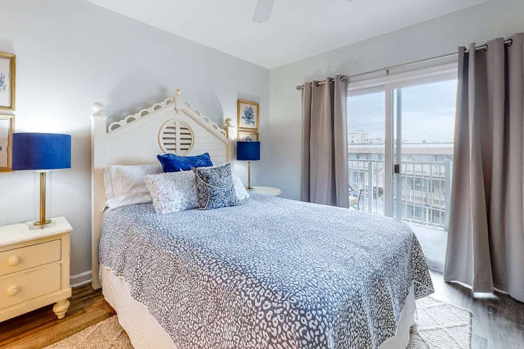Renovated Corner Condo with Ocean View Balcony, Fireplace, & Shared Pool