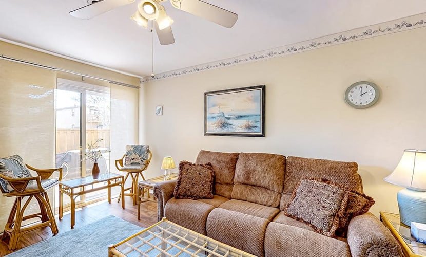 Quaint condo with sauna, tennis court, pool, grill, yard, and patio