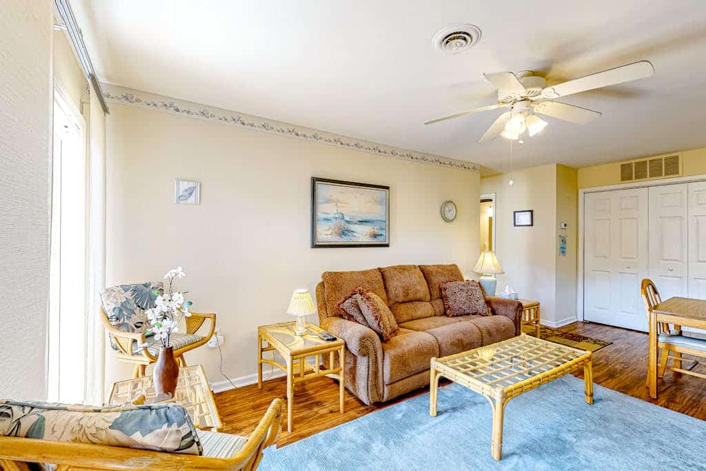 Quaint condo with sauna, tennis court, pool, grill, yard, and patio