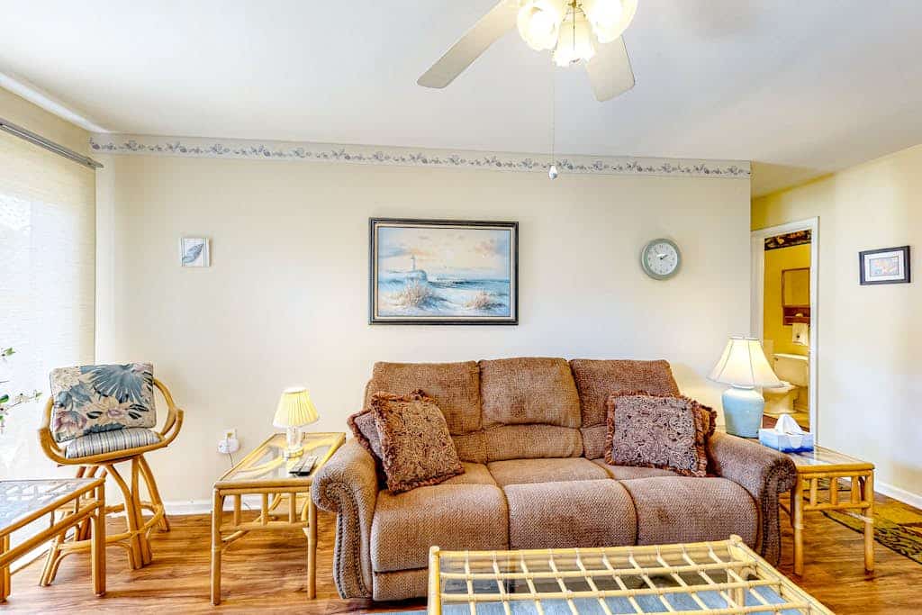 Quaint condo with sauna, tennis court, pool, grill, yard, and patio
