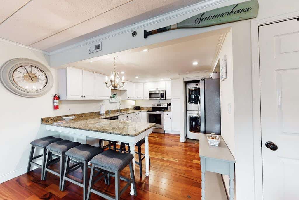 Updated waterfront condo with washer/dryer, central AC, & seasonal pool