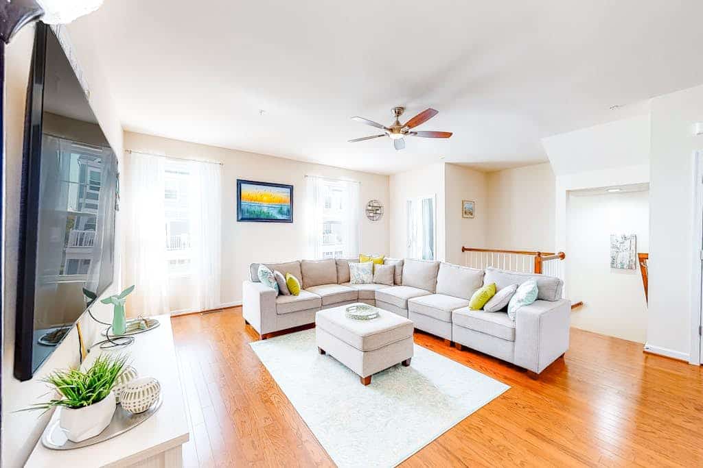 Bay-view townhome with private deck, pool access, central AC, & W/D