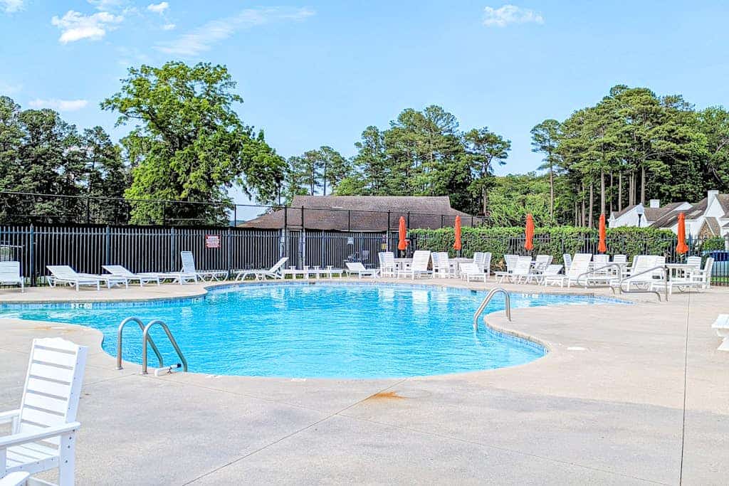 Coastal resort with pool, golf, fireplace, W/D, sunroom & beach access
