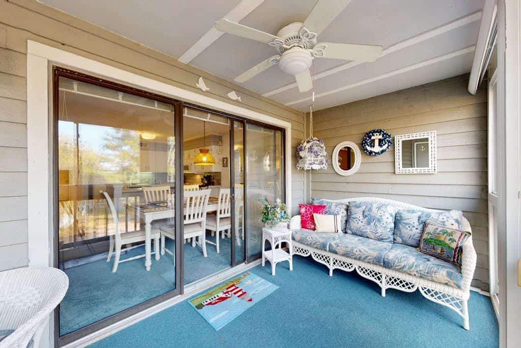 Coastal condo with shared pool, balcony, open layout, internet, W/D, & AC