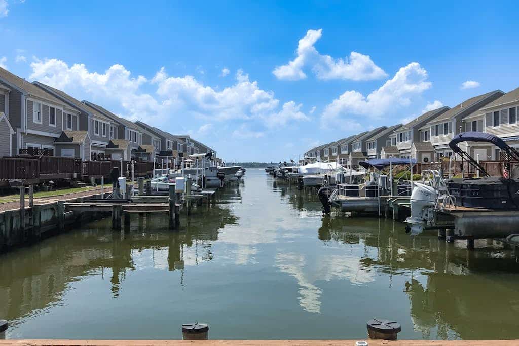 Charming 2 story - waterfront retreat, w/private deck, boat slip & canal views