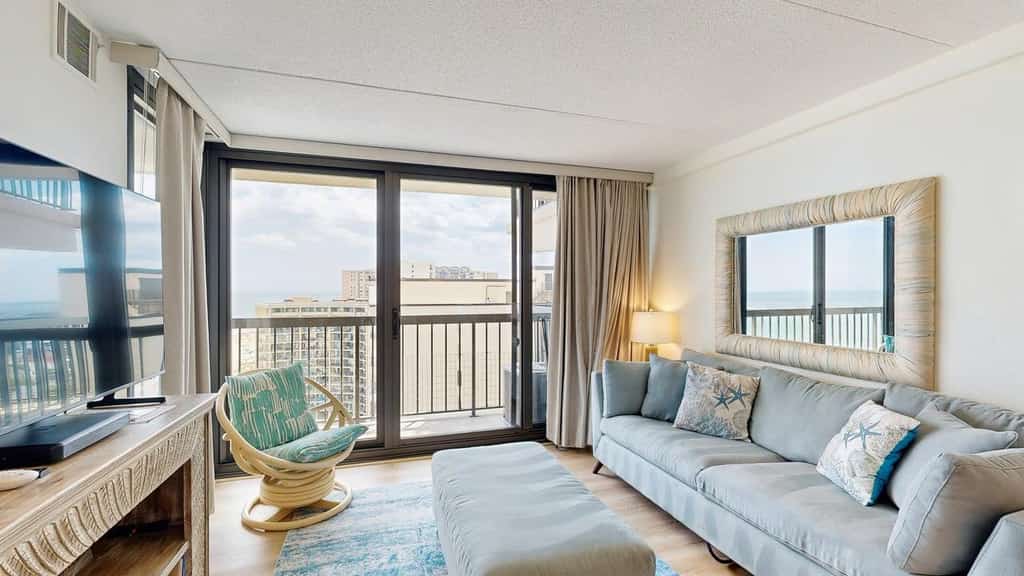 Serene oceanfront condo with beach views, pools, gym, tennis & sauna
