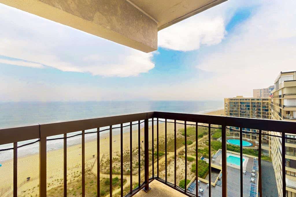 Joyful beachfront condo with balcony, views, pools, gym, game room & tennis