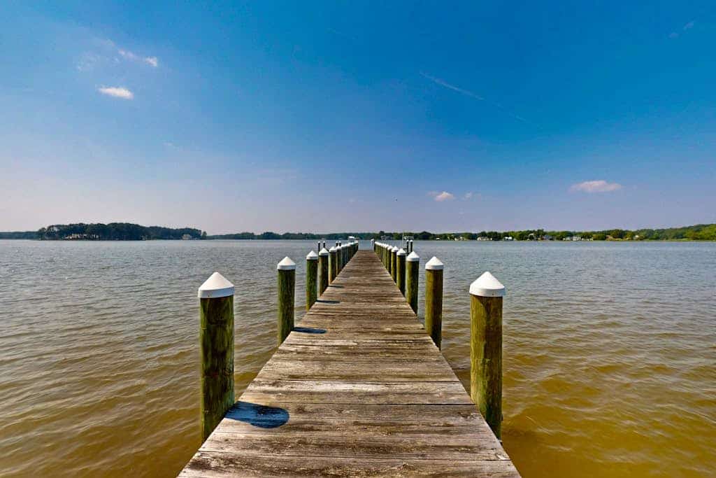 Magnificent waterfront paradise w/private dock & access to community pool