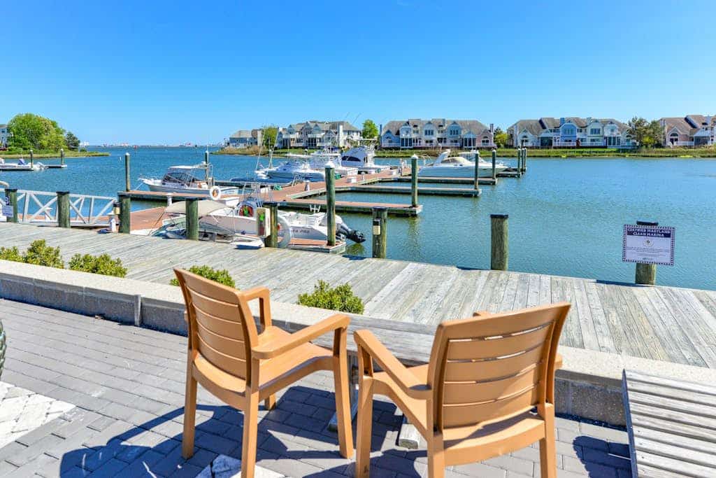 Waterfront townhome on the golf course with private deck, & paid-access pools