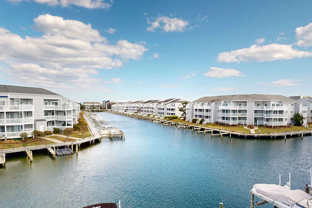 Sunny Waterfront Condo w/Canal Views, Balcony, Central AC, Shared Pool & Tennis