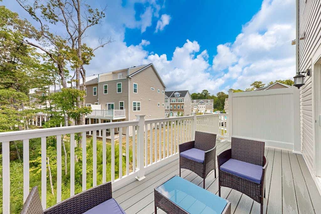 Luxury townhome with pool, open layout, deck community pool - close to shopping