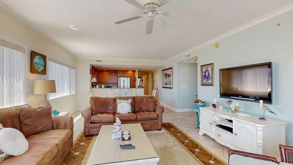 Ocean-view condo with balcony, central AC, W/D, pool, gym & coastal decor