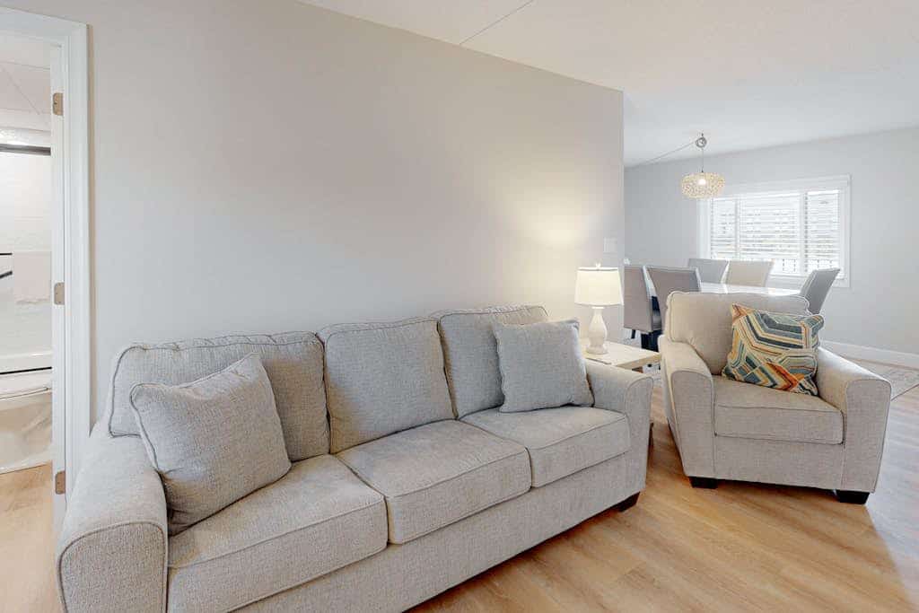 Fully updated, spacious, 2nd-floor condo, W/D, central AC, & WiFi - near beach