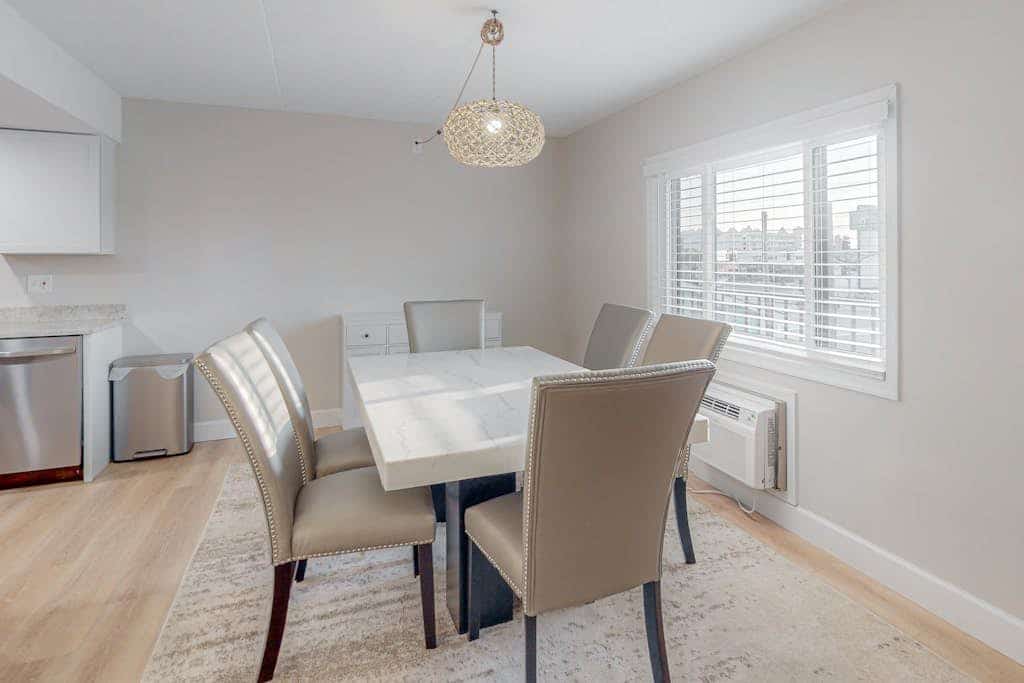 Fully updated, spacious, 2nd-floor condo, W/D, central AC, & WiFi - near beach