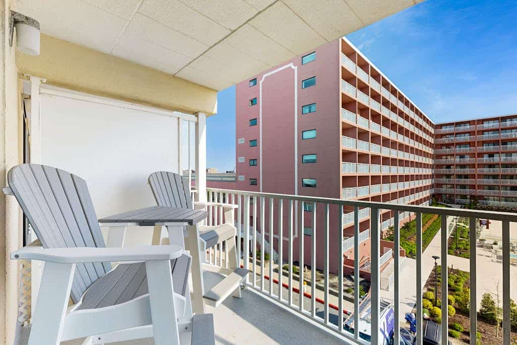 Mid-town, ocean-view condo with balcony & pool access - steps from the beach