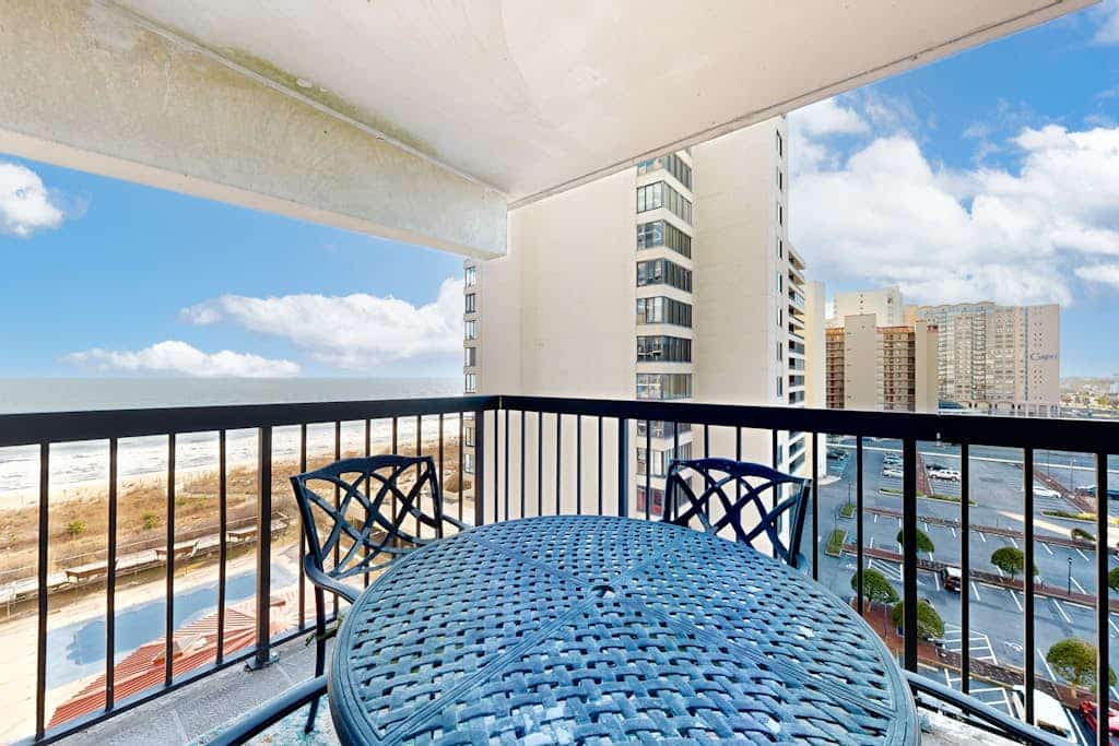 Colorful, ocean-view condo with scenic balcony, 3 pools, washer/dryer & AC
