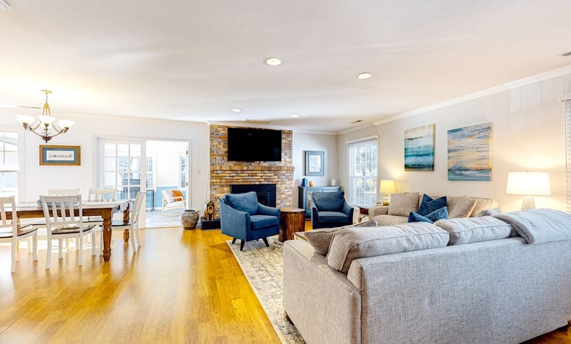 Gorgeous home with an enclosed yard, grill, fireplace, chef's kitchen, AC, & W/D