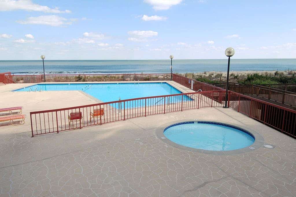 Oceanfront condo near golf & the beach with pool, balcony, W/D, & central AC