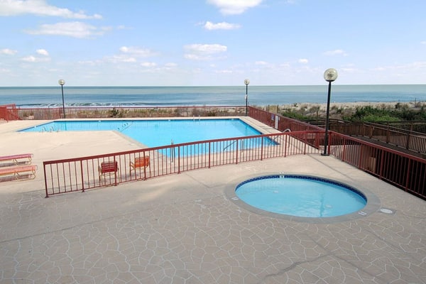 Oceanfront condo near golf & the beach with pool, balcony, W/D, & central AC