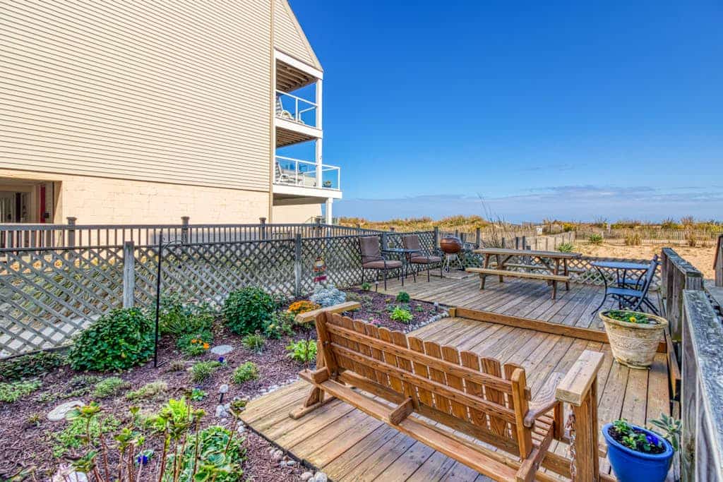 Bright beachfront condo with balcony, amazing views, W/D, & central AC