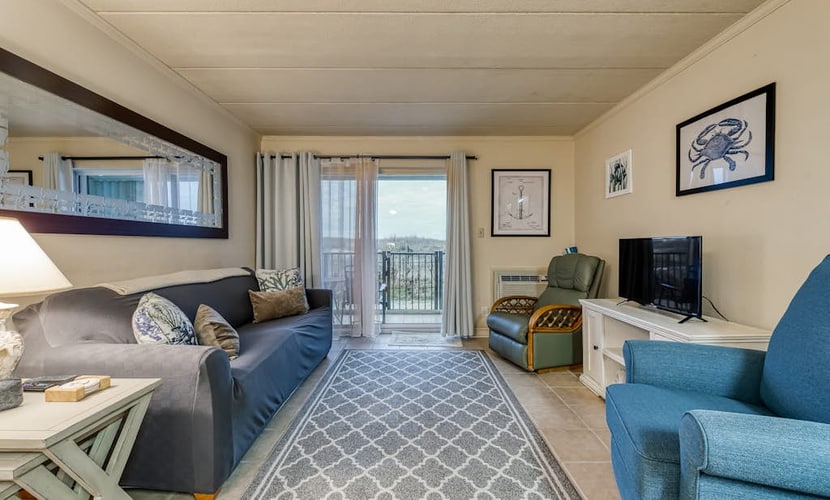 Charming 1st-Floor Condo w/Private Balcony, Free WiFi, Partial A/C, and W/D