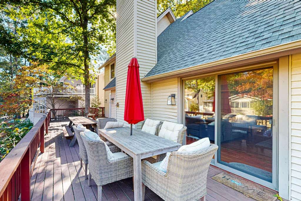 Home on canal with views, pool/tennis access, spacious deck & lovely interior