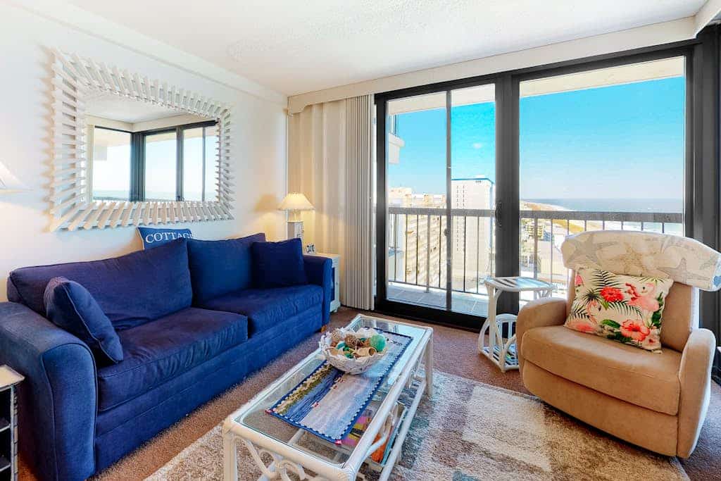 Private beach condo with balcony, washer/dryer, pools, gym & tennis courts