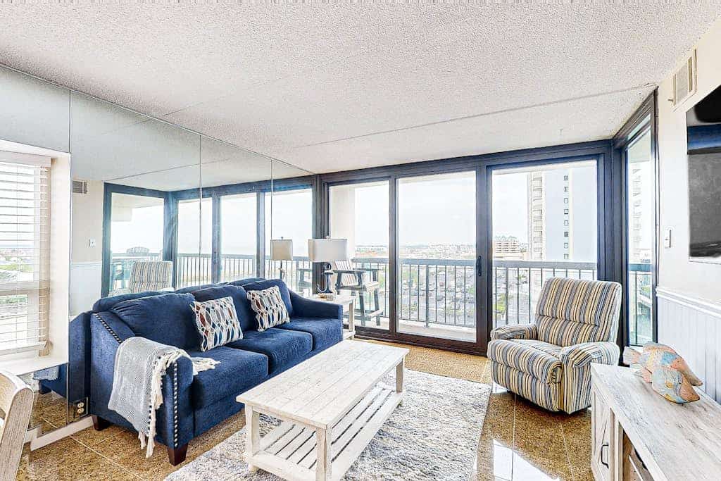 Luxury condo with bay and ocean views, pool, and beach access