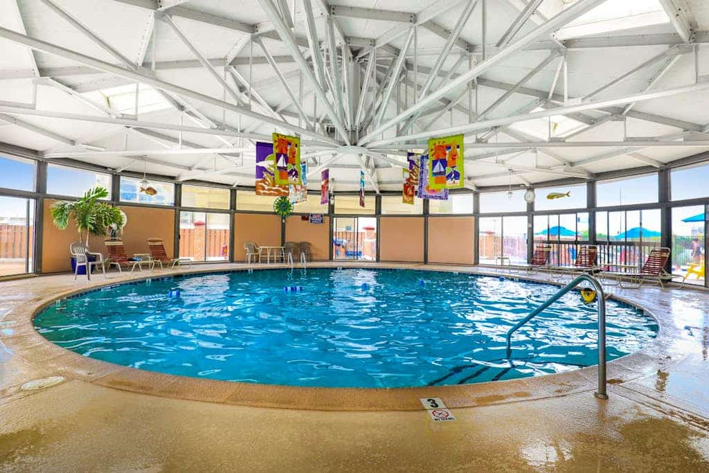 Luxury condo with bay and ocean views, pool, and beach access
