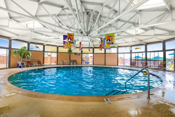 Luxury condo with bay and ocean views, pool, and beach access